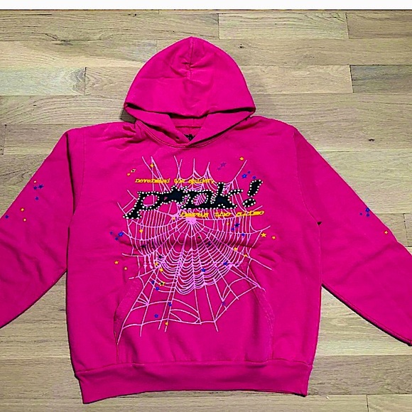 I am selling a spider hoodie it is all over TikTok it is pink and it’s medium - Picture 1 of 1